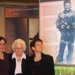Gretl and her other daughter Judith (left) at an exhibition of Jewish resistance featuring her sister in law Ruzska on the poster