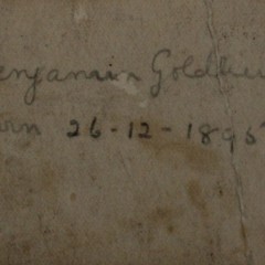 Father's details behind photograph